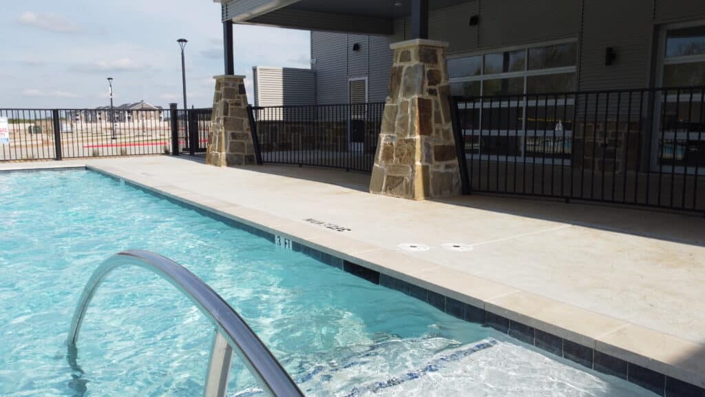 swimming pool with crystal clear water at Ennis luxury RV resort