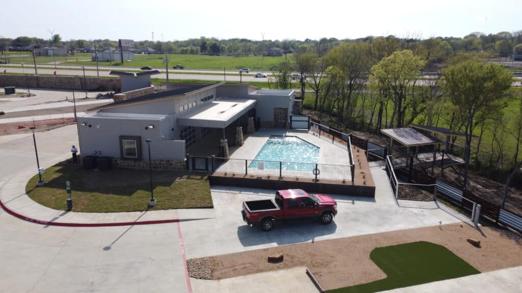 Ennis luxury RV resort view showing the architecture, pool area and outdoor scenes