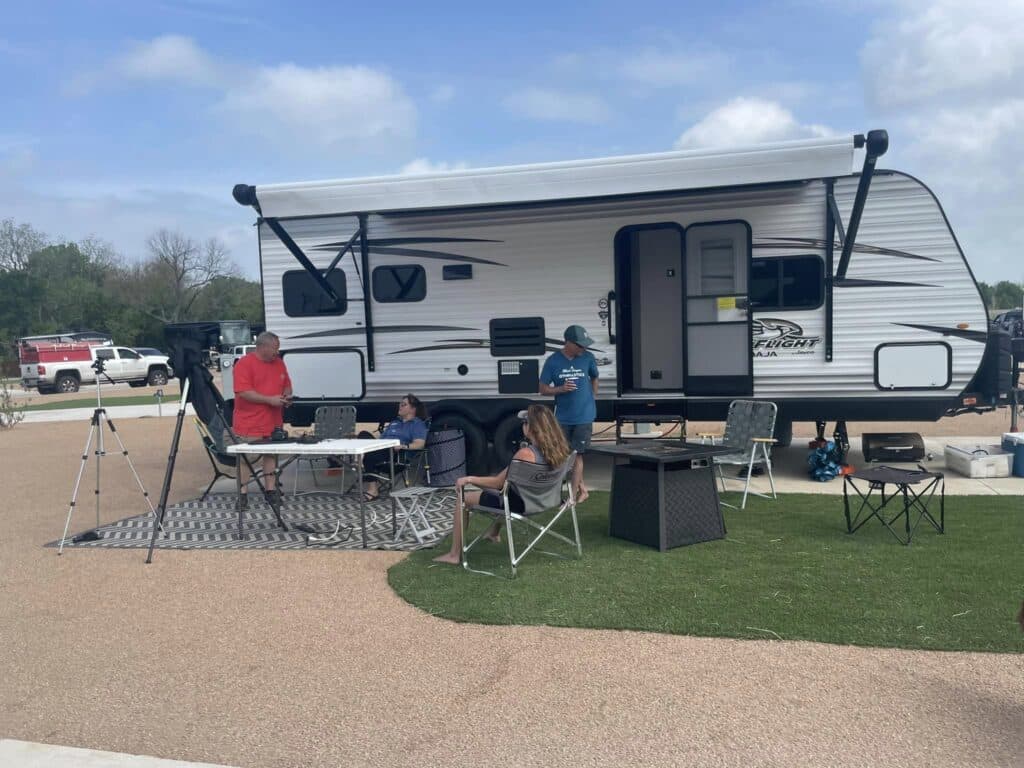 People enjoying outdoor activities at Ennis luxury RV resort